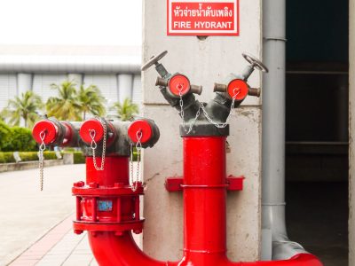 Red fire hydrant in Thailand.